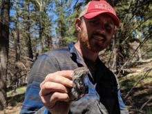 Neil Dutt handling white-bellied vole