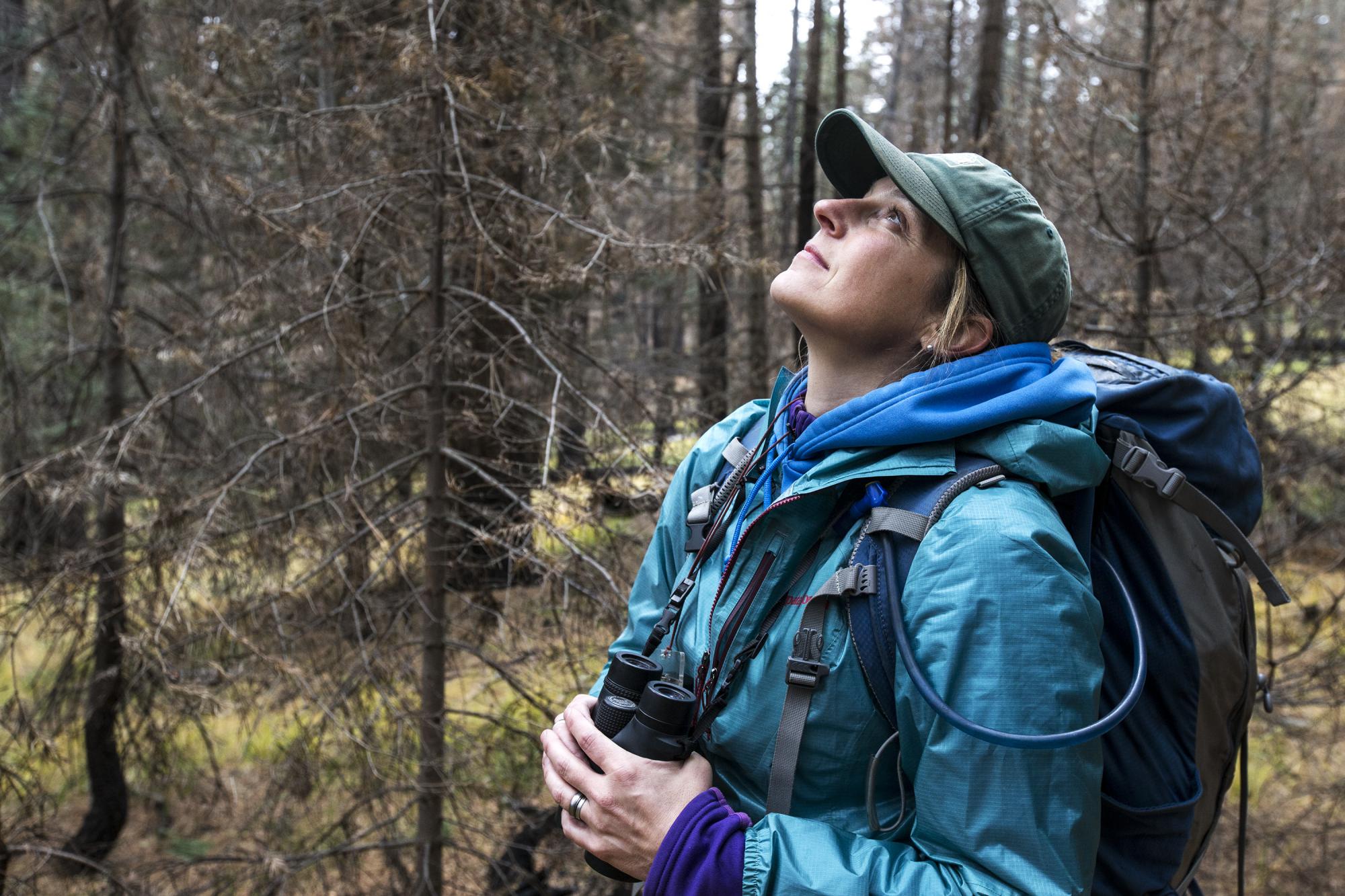 Melissa Merrick with binoculars