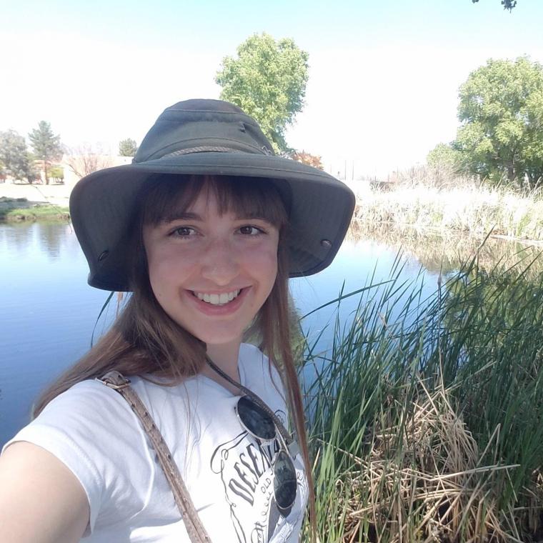 Sandy Slovikosky in front of pond